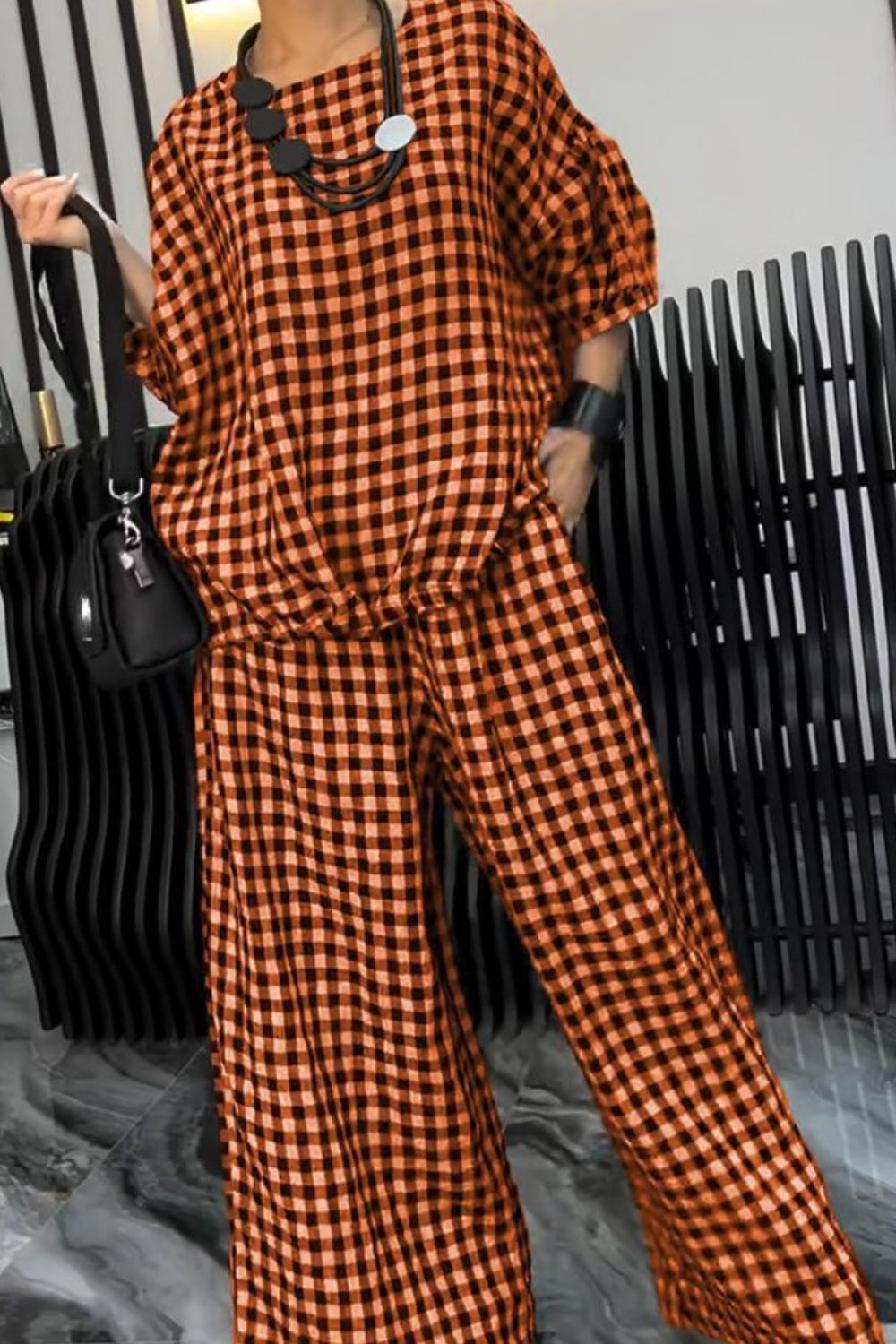 
                  
                    Full Size Plaid Round Neck Half Sleeve Top and Pants Set
                  
                